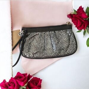 Wilson’s leather wristlet Used 1x black silver zipper close. holiday par…